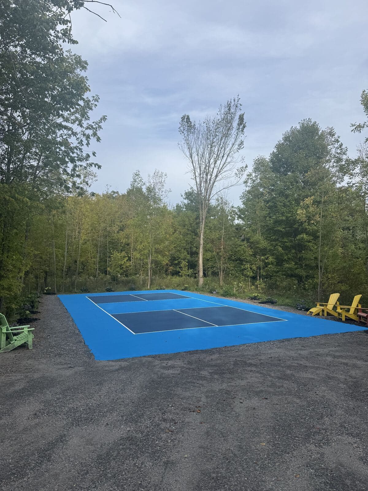 Backyard pickleball court built by RAFTIS in Muskoka